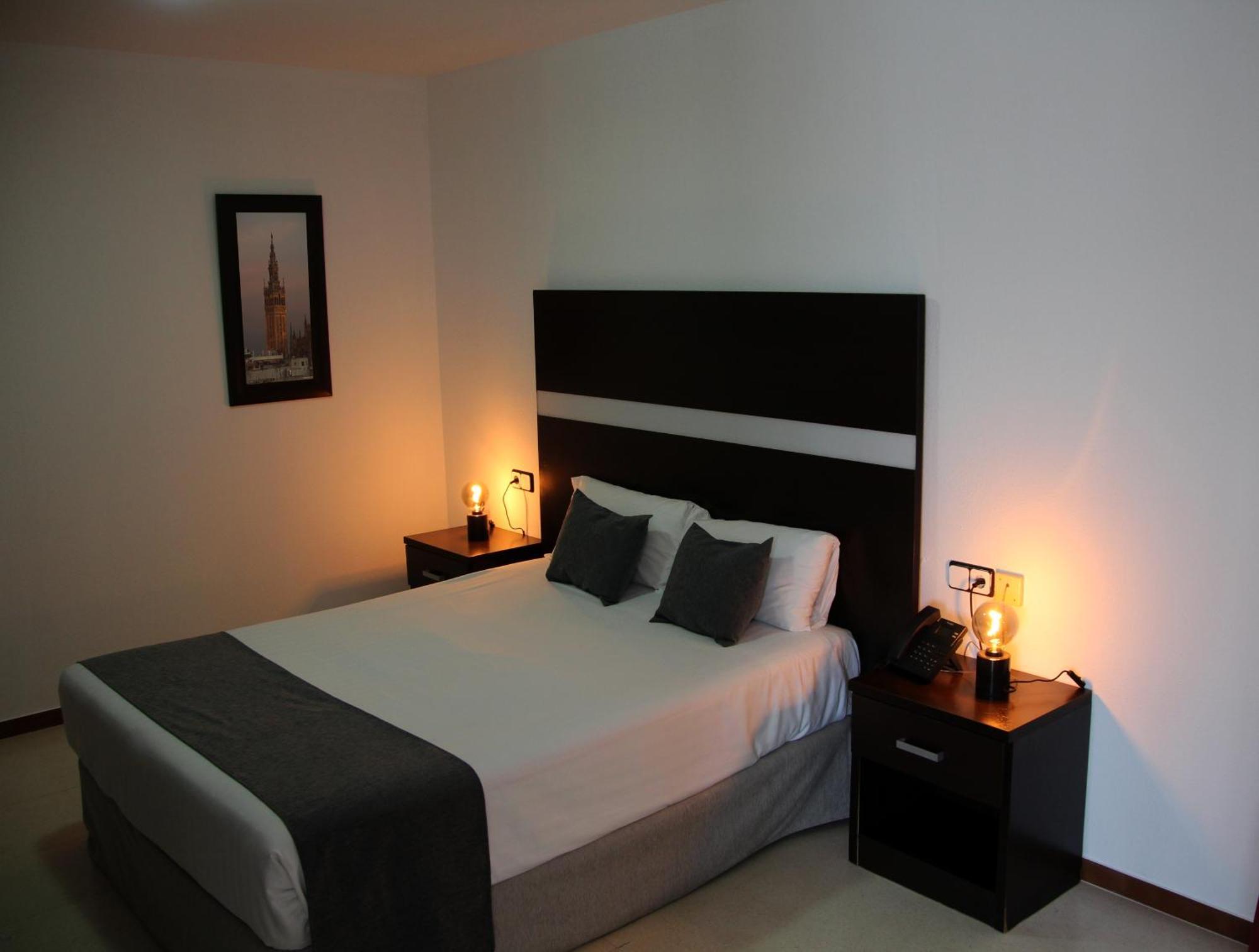 Hospedium Hotel Blu Torre De Sevilla Torre de la Reina ภายนอก รูปภาพ